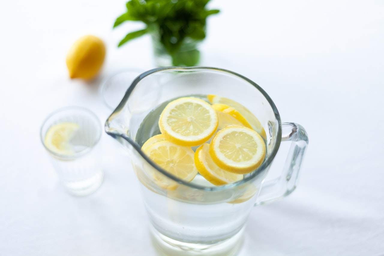 Drinking Lukewarm Water with Lemon Meaning Benefits Pros Advantages Limitations Cons and Disadvantages for Coronavirus (Covid-19) Photo